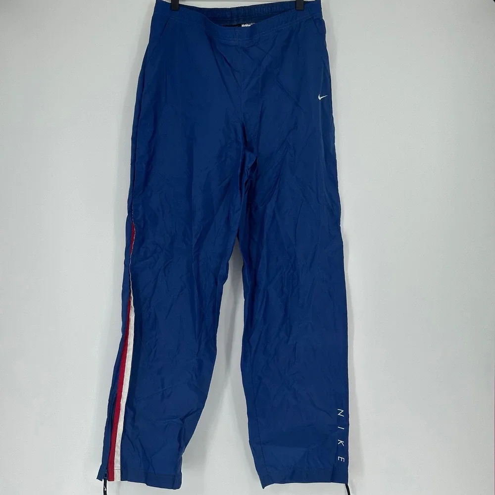 Vtg 90s Nike Kids Blue Nylon Track‎ Pants with Red White Stripe Accent XL READ
